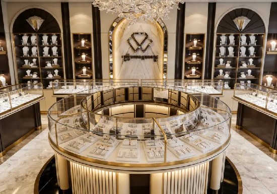 Gilded Marble & Dark Wood Luxury Jewelry Store Design