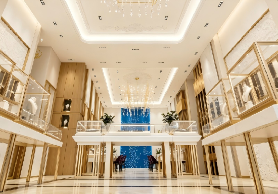 Grand Chandelier-Focused Jewelry Boutique: Luxurious Marble & Wood Display System for Flagship Stores