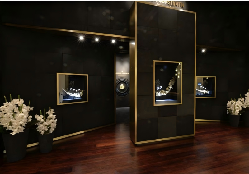 Sleek Dark-Toned Watch Boutique: Modern Glass Display System for High-End Mall Retail