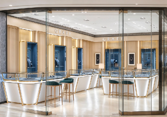 White Curved Counters & Navy Recessed Wall Vitrines